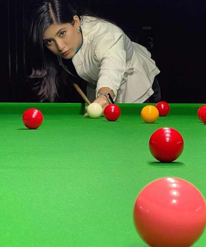 Safa Kabir with Pool Ball